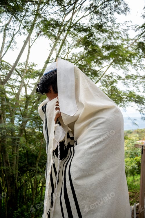Preview: The praying Jew covers his head and face with tefillin. He prays to his god in solitude and intimacy