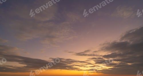Preview: Sunset sky. Abstract nature background. Dramatic blue and orange, colorful clouds at twilight time.