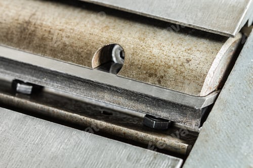 Preview: Shaft with sharp knives of woodworking jointer сlose-up