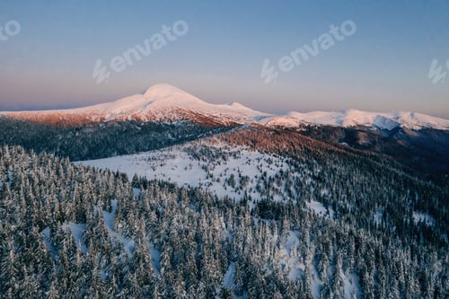 Preview: Winter aerial landscape of majestic Carpathian mountains. Background with sunset