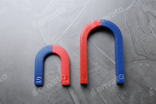 Preview: Red and blue horseshoe magnets on grey background