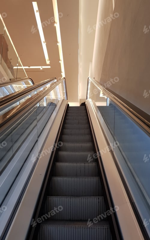 Preview: Low angle View towards the top of an empty escalator.