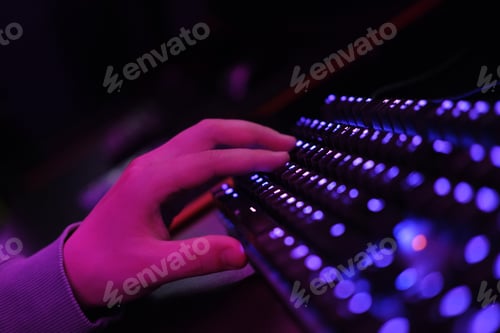 Preview: Close-up of a keyboard in neon color