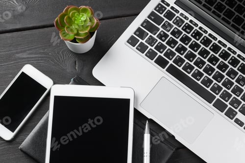 Preview: Open laptop with digital tablet and smartphone