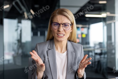 Preview: Video call, upset and disappointed woman looking into webcam, talking to colleagues and partners