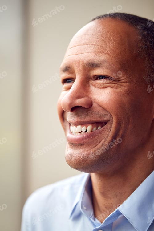Preview: Head And Shoulders Portrait Of Mature Man Or Businessman Standing By Window In Office Or At Home