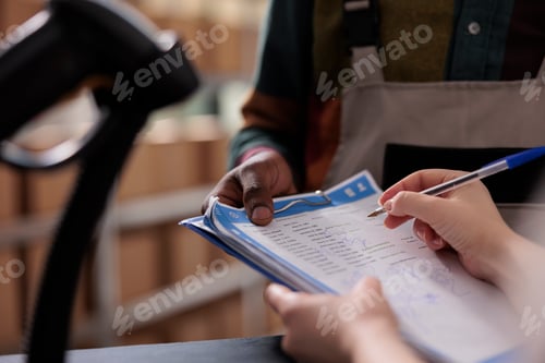 Preview: Warehouse manager signing cargo checklist