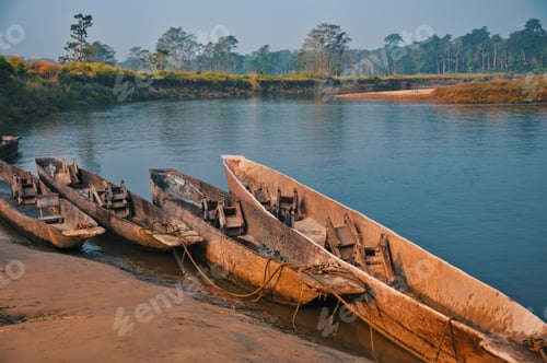 Preview: Closeup of traditional wooden boats in Chitwan National Park