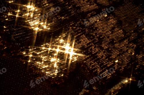 Preview: Abstract festive gold background made of sequins.