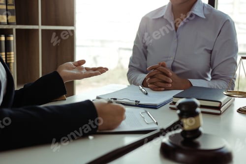 Preview: Lawyer is giving advice to clients who have consulted about legal issues regarding rights infringeme