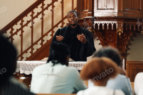 Preview: Young pastor delivering sunday sermon from the pulpit