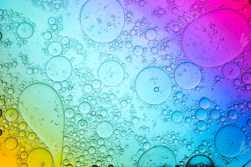 Preview: Chaotic oil drops spilled on spectrum colored surface