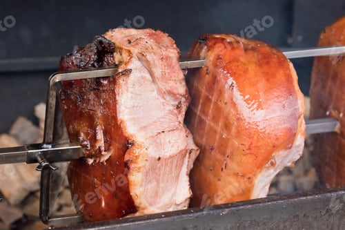 Preview: roasted pig knuckle on the spit