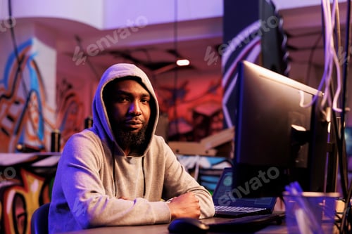 Preview: Hacker doing illegal activities portrait