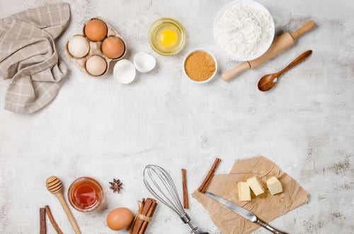 Preview: Ingredients for making dough dishes: cakes, cookies, muffins, pies on a gray background.