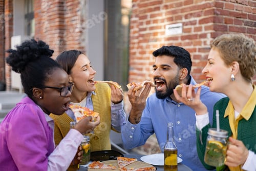 Preview: Friends Enjoying Pizza Outdoors