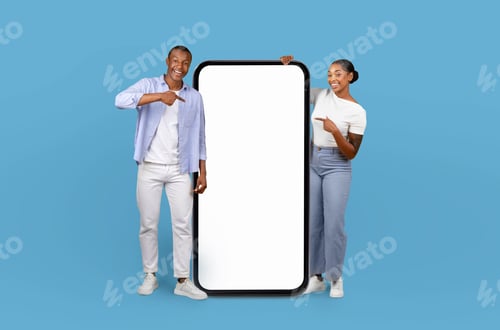 Preview: African American couple stand next to large smartphone