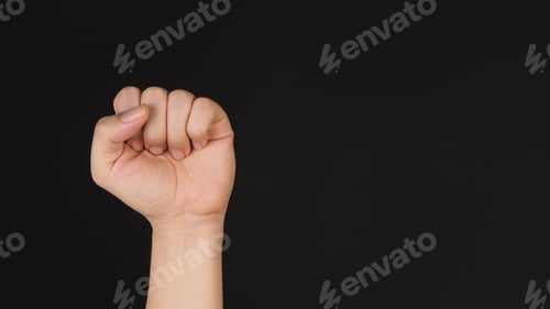 Preview: Pain hand sign or gesture on black background.