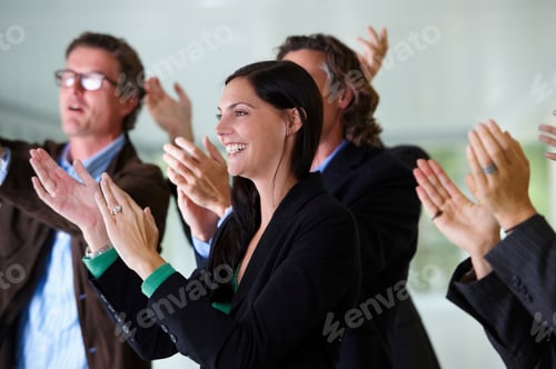 Preview: Business team applauding, smiling