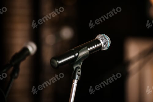 Preview: Close up of microphone in concert hall or conference room