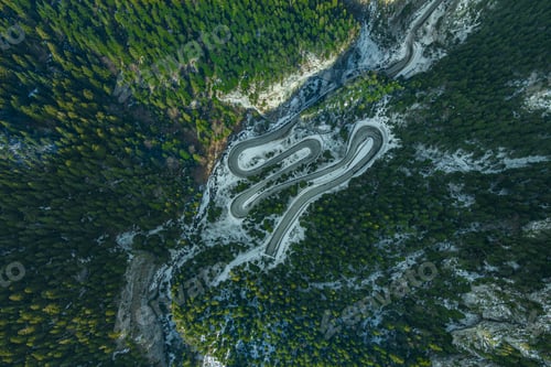 Preview: Aerial drone view of a mountain road serpentine