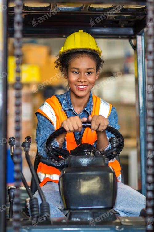 Preview: women worker at forklift driver happy working in industry factory logistic ship.