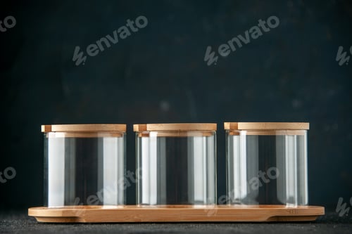 Preview: front view empty glass cans on dark background kitchen cutlery flask darkness color photo