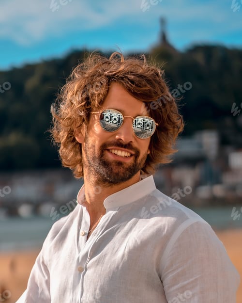 Preview: Summer lifestyle with a young dark-haired Caucasian man with long beard