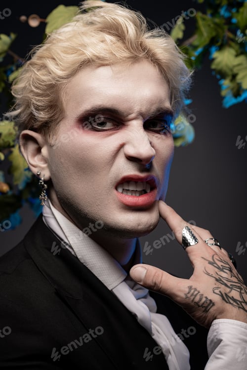 Preview: Epic Halloween transformation of a young handsome man in a dramatic costume and makeup