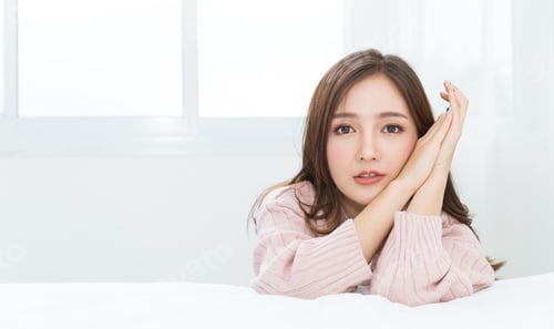 Preview: Portrait of young beautiful sexy asian woman relax in her bedroom