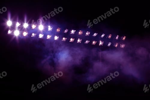 Preview: Glowing shiny stadium lights and smoke in the dark