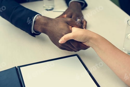 Preview: Business Contract Documents Handshake Concept