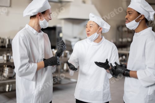 Preview: Chefs have some conversation in the professional kitchen at job