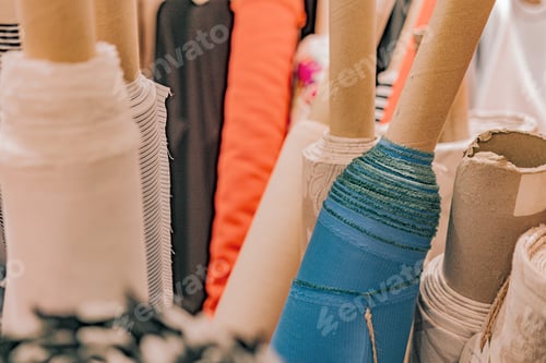 Preview: Rolls of Colorful Fabric in a Textile Shop