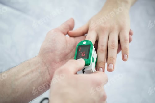 Preview: Patient Finger Pulse Trace Oximeter close-up. Taking Pulse