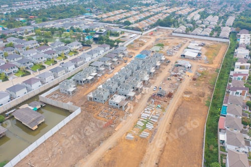 Preview: Busy industrial under construction site workers working and excavators. Top view of precast concrete