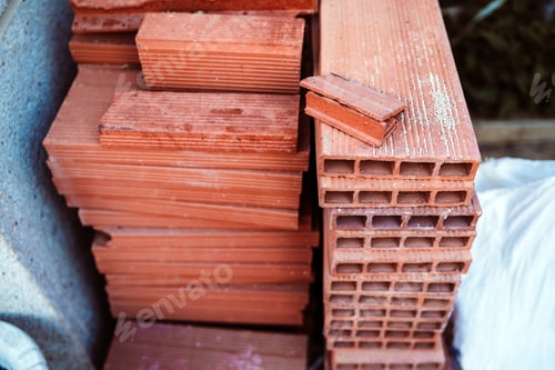 Preview: stacked bricks at home in construction site during home improvement