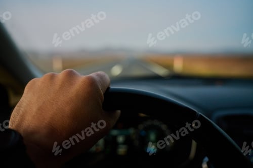 Preview: Man driving car on highway road, inside view