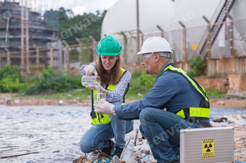 Preview: Environmental engineer or workers examining waste water