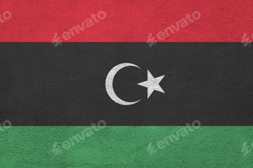 Preview: Libya flag depicted in bright paint colors on old relief plastering wall close up