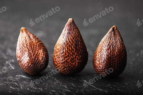 Preview: Salak fruit or snake fruit on black background