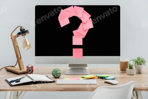 Preview: modern workplace with pink question mark made of sticky notes on computer monitor and stationery at