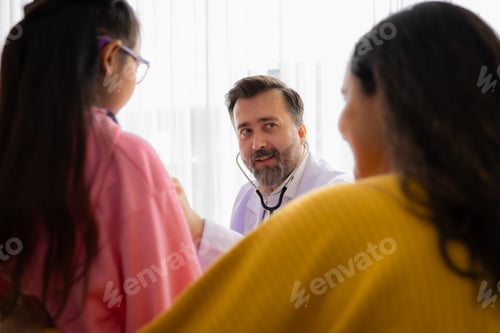 Preview: Doctor with stethoscope examining kid patient in hospital. Healthcare and medical concept.