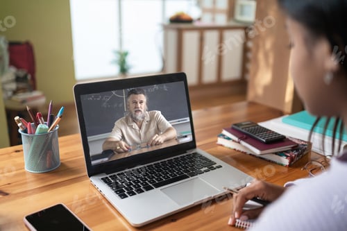 Preview: Distance learning online education. Student studies at home and does school homework