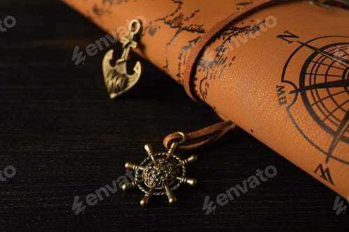 Preview: Columbus Day. Pendants in the form of an anchor and a steering wheel