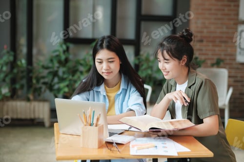 Preview: Startup asian business teamwork concept discussing graphs showing the results.