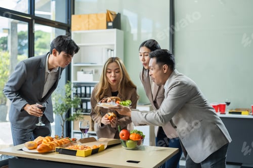 Preview: celebration successful deal with champagne and pizza in the workplace.
