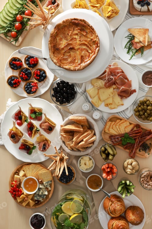 Preview: Dishes with different food on table, flat lay. Luxury brunch