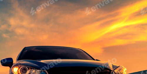 Preview: Front view blue compact SUV car with sport and modern design parked on road with sunset sky