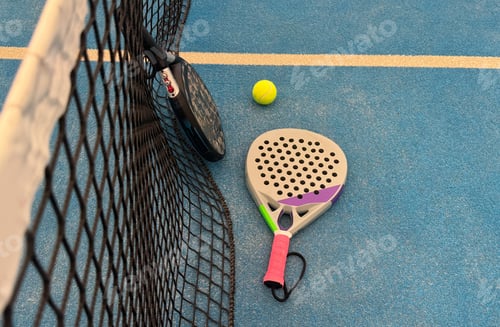 Preview: Padel tennis racket. Background with copy space. Sport court and balls.